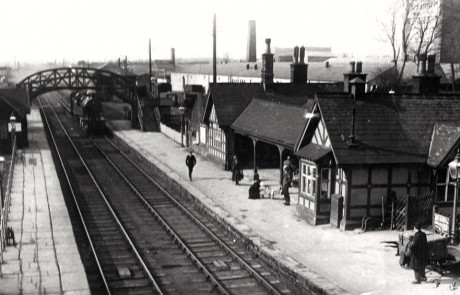 1930s Eastbound train approaching platform one.