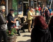 People celebrating at Bentham Station.